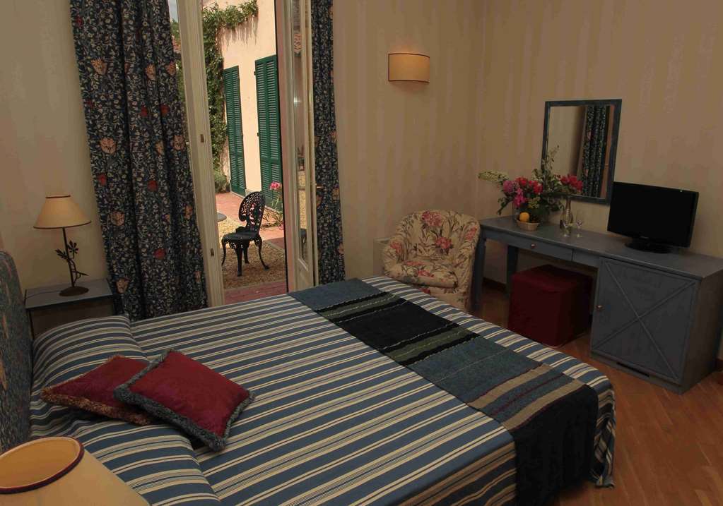 Hostellerie Du Golf Pecetto Cameră foto